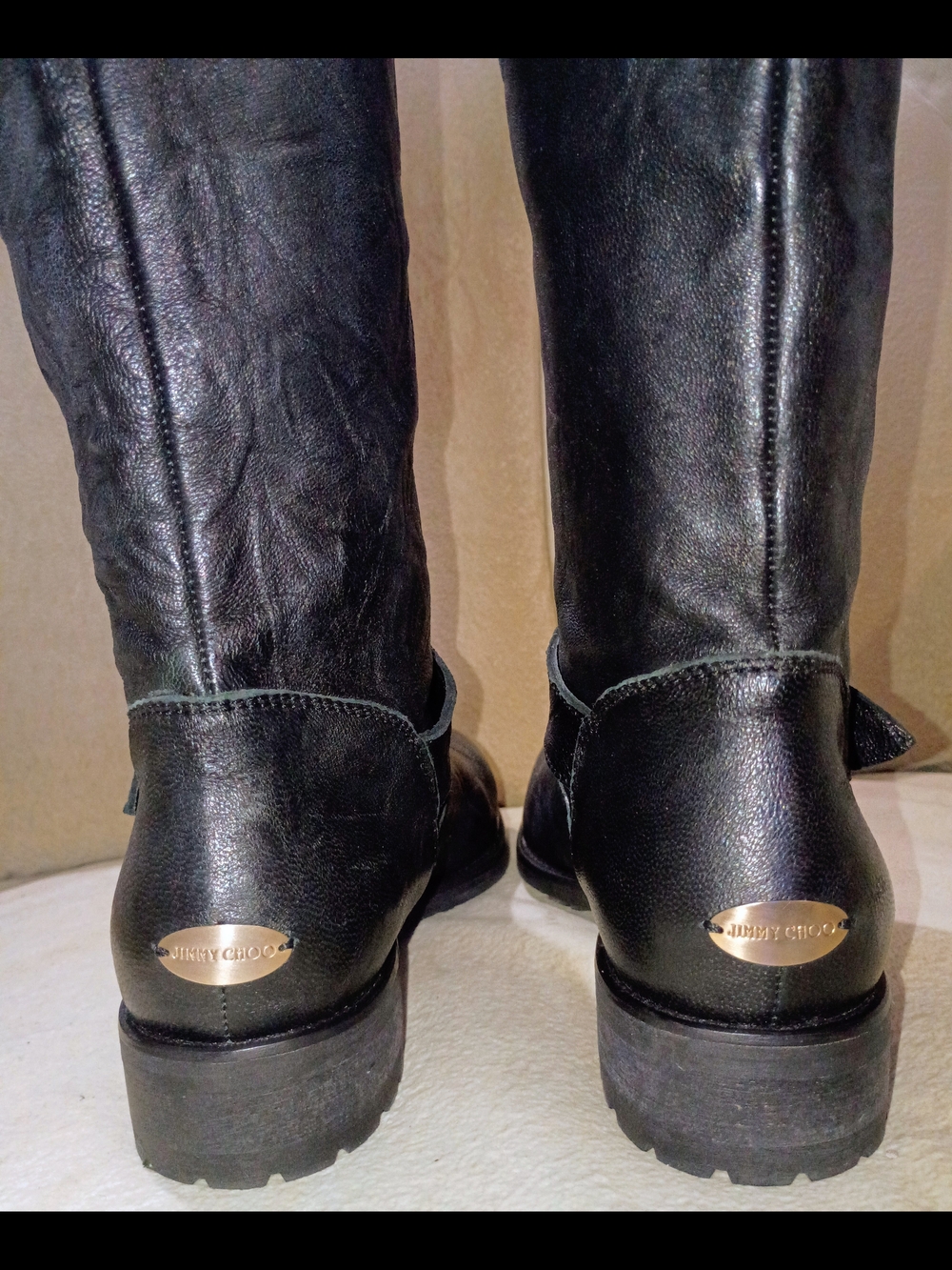 Jimmy Choo Black Leather Knee-High Boots with Gold Plaque